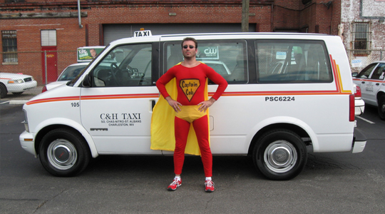 Services - Captain Cab standing near a Taxi cab -  C&H Taxi
